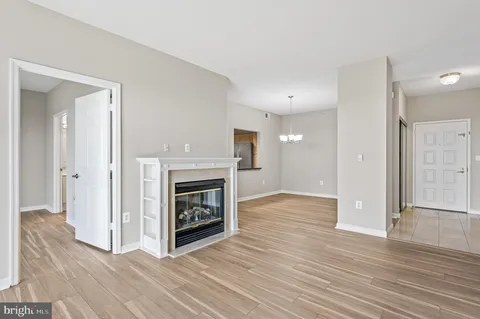 a view of a kitchen from the hallway