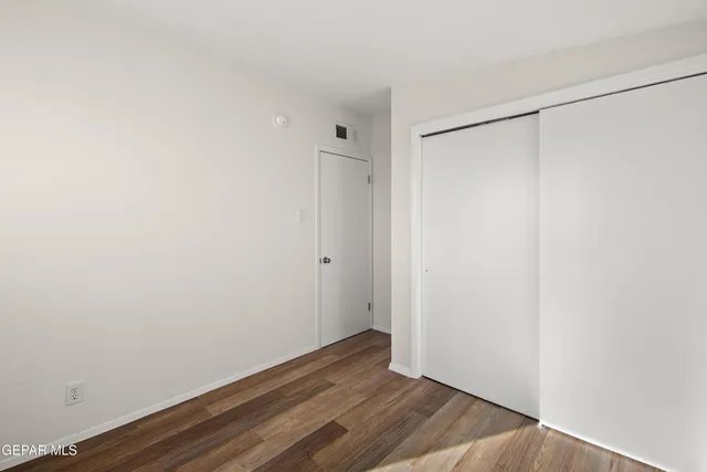 a view of small space with wooden floor