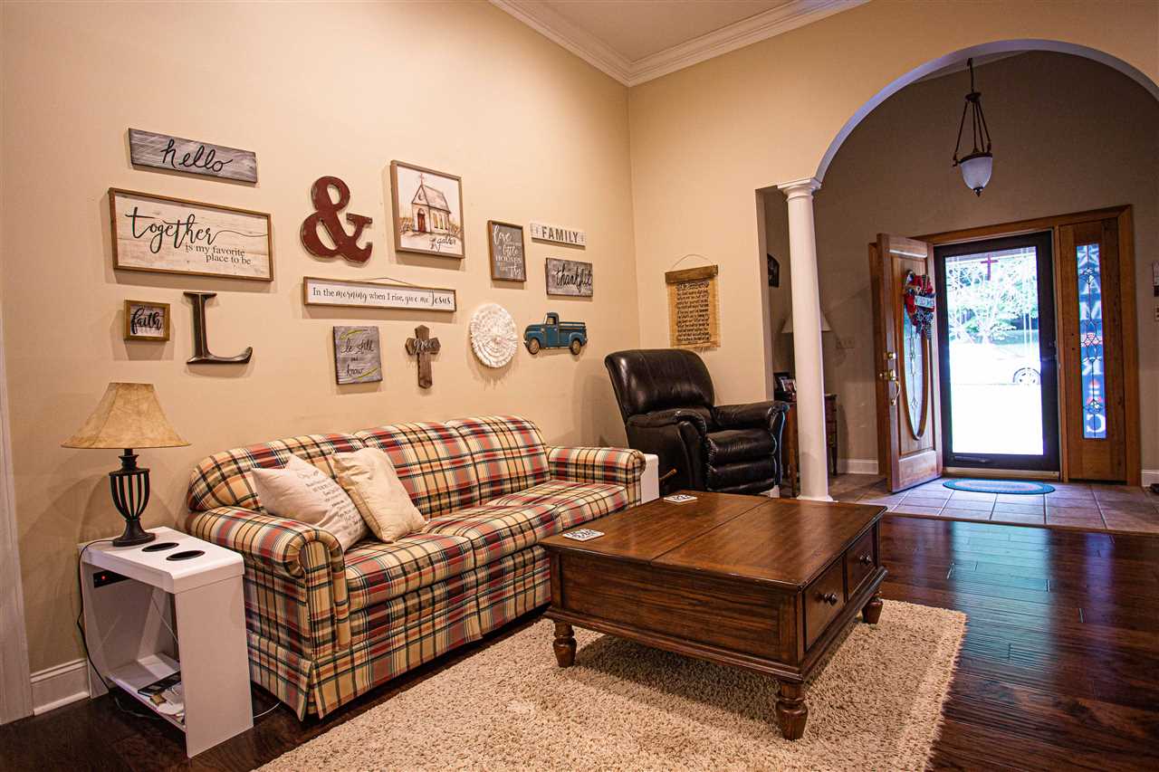 280 Church Street Ripley, TN 38063 - Photo 4 of 25 a living room with furniture and wooden floor