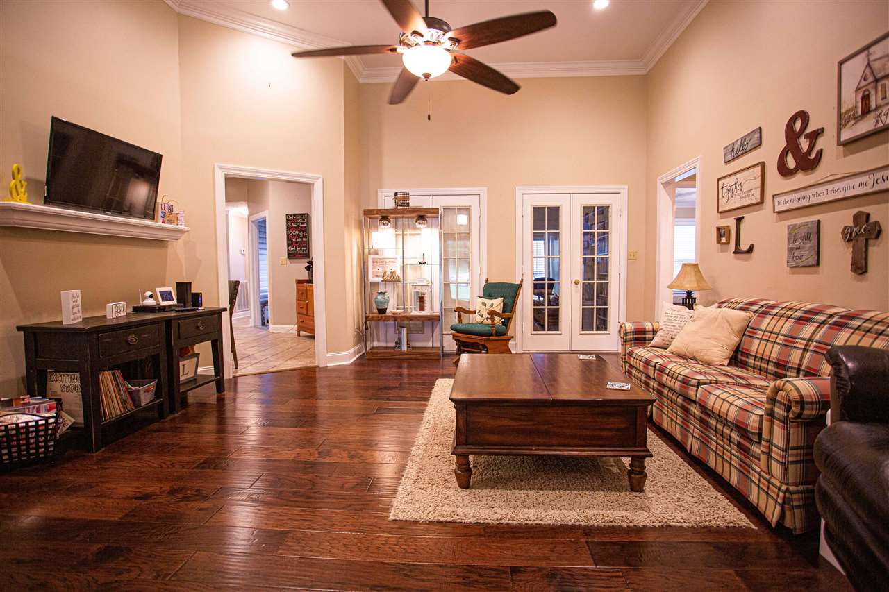 280 Church Street Ripley, TN 38063 - Photo 5 of 25 a living room with furniture and a flat screen tv
