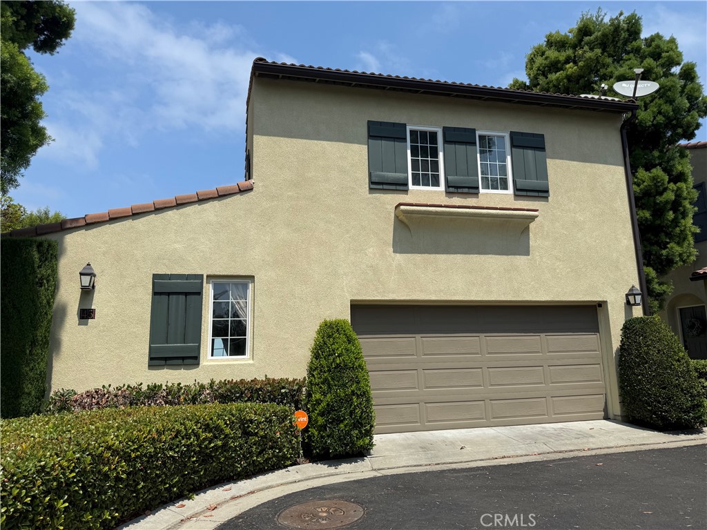 45 Avondale Irvine, CA 92602 - Photo 2 of 2 a front view of a house with a garage
