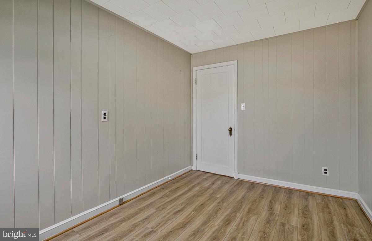 3040 Federal Street Baltimore, MD 21213 - Photo 23 of 41 a view of an empty room with wooden floor