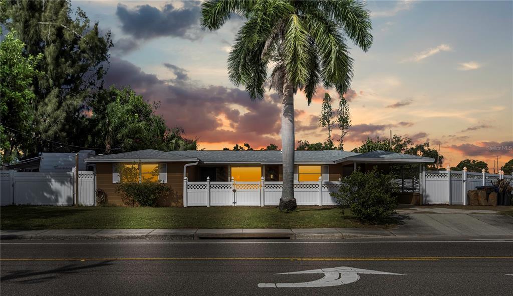 2920 McIntosh Road Sarasota, FL 34232 - Photo 1 of 1 a view of a house with a yard