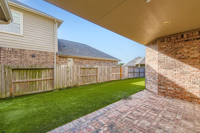 a view of a backyard with a garden