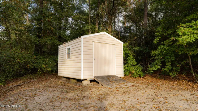 a view of backyard of house