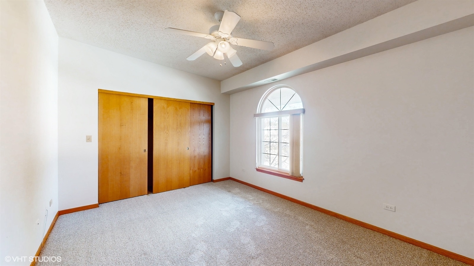 2851 West Heritage Drive, Unit 2C Joliet, IL 60435 - Photo 13 of 23 a view of an empty room with a window
