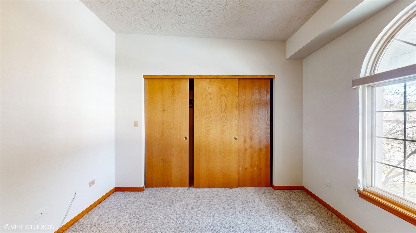 2851 West Heritage Drive, Unit 2C Joliet, IL 60435 - Photo 14 of 23 an empty room with windows