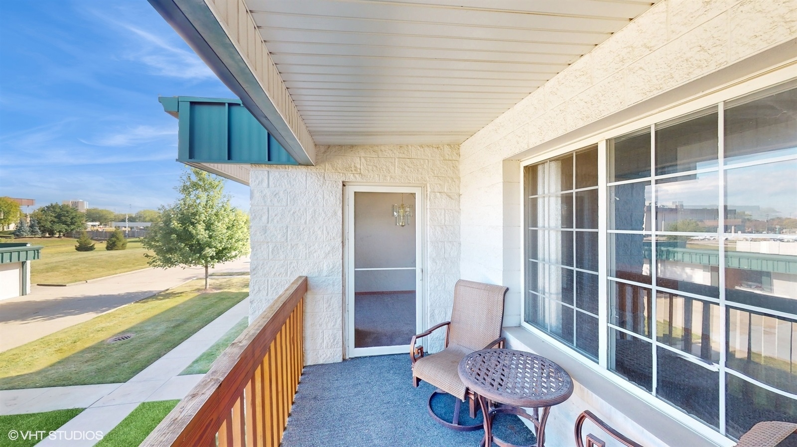 2851 West Heritage Drive, Unit 2C Joliet, IL 60435 - Photo 20 of 23 a view of a balcony with chair