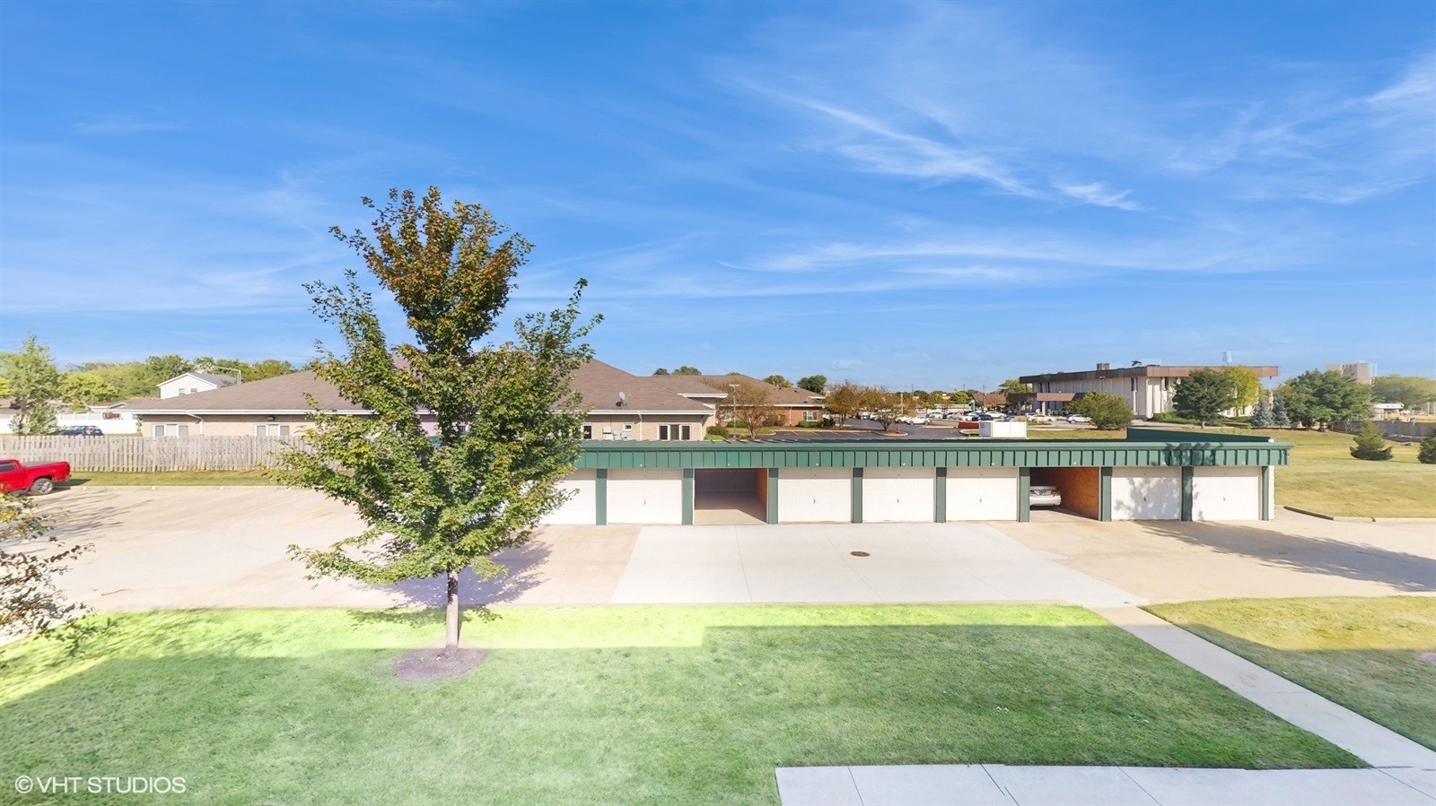 2851 West Heritage Drive, Unit 2C Joliet, IL 60435 - Photo 21 of 23 a view of a house with a yard