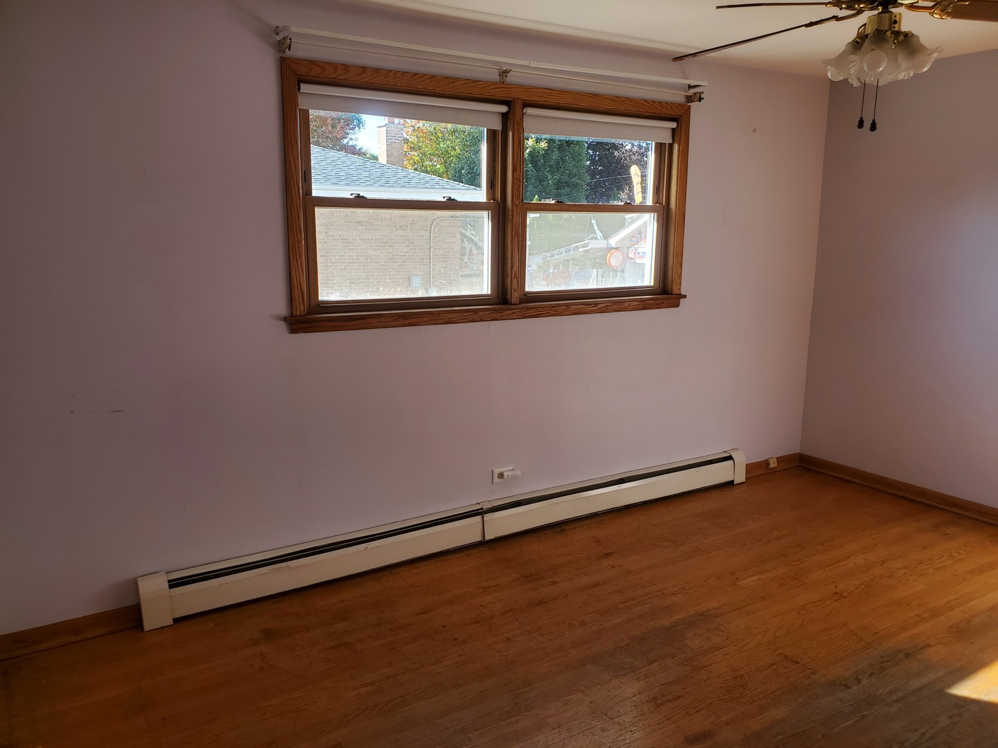 10912 Princess Avenue Chicago Ridge, IL 60415 - Photo 7 of 17 a view of an empty room with a window
