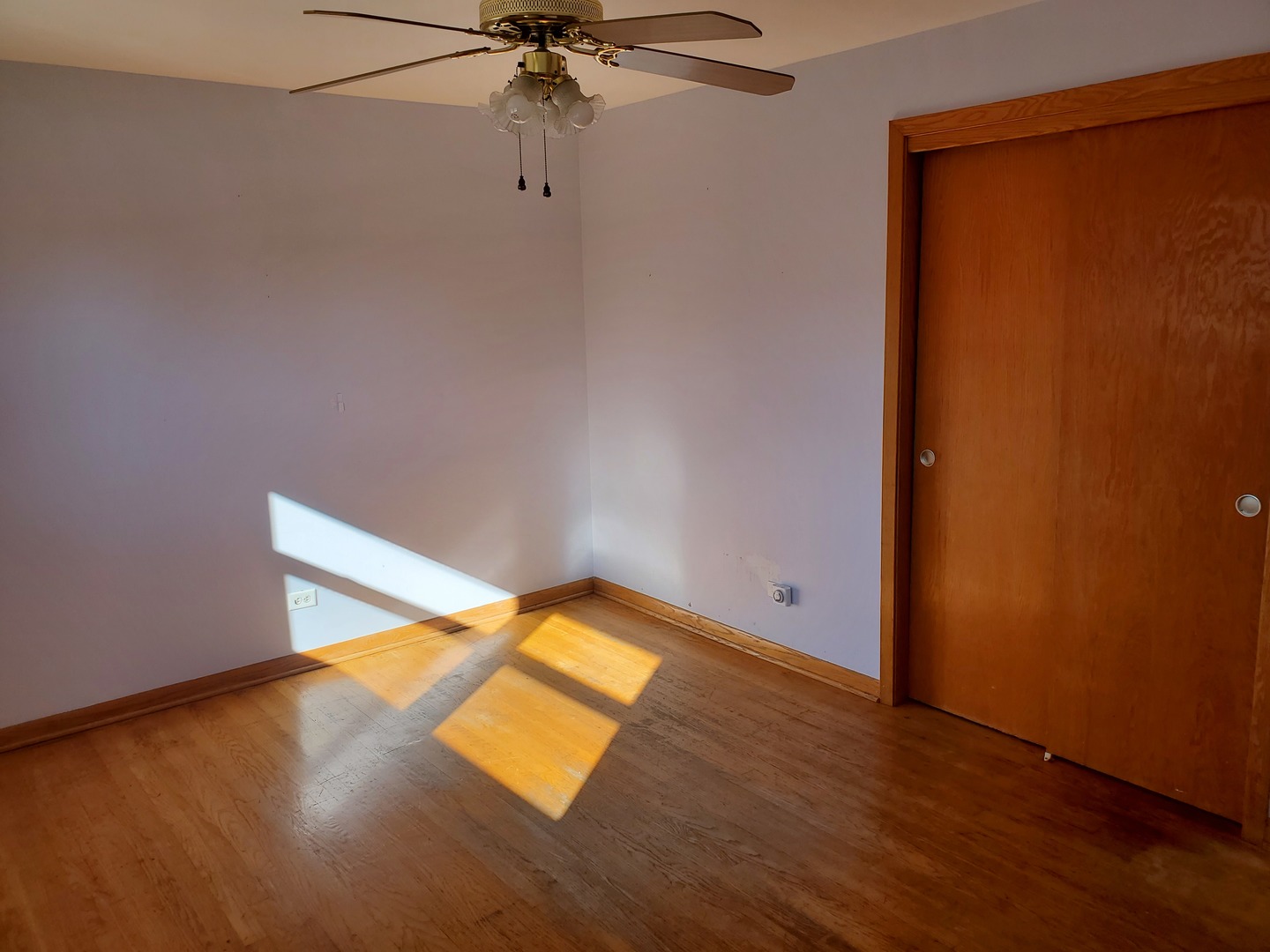 10912 Princess Avenue Chicago Ridge, IL 60415 - Photo 9 of 17 an empty room with a empty space and a window