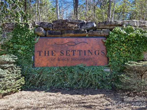 a sign on the side of the road