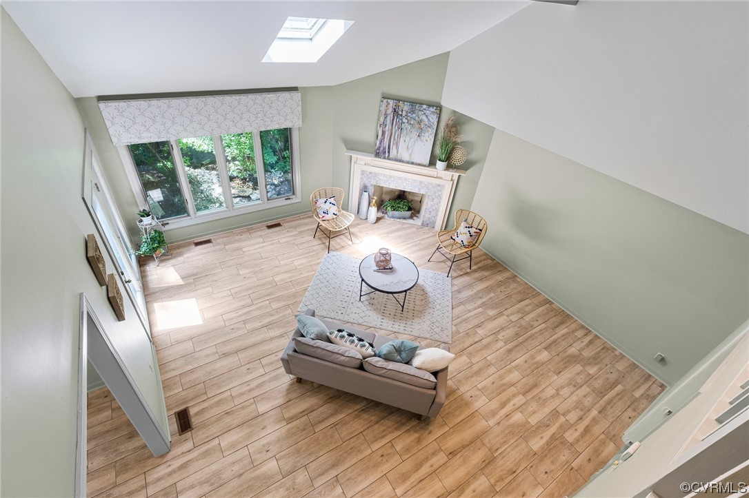 3820 Dunleith Terrace Midlothian, VA 23113 - Photo 28 of 48 a living room with furniture and a wooden floor