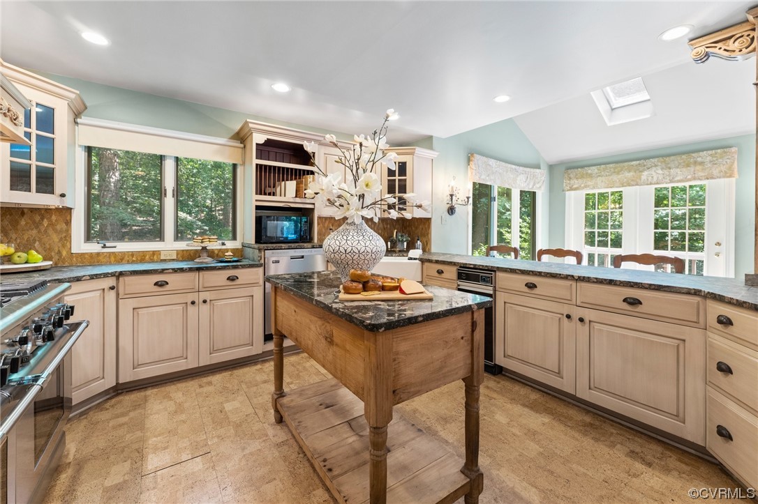 3820 Dunleith Terrace Midlothian, VA 23113 - Photo 10 of 48 a kitchen with granite countertop a sink stove and cabinets