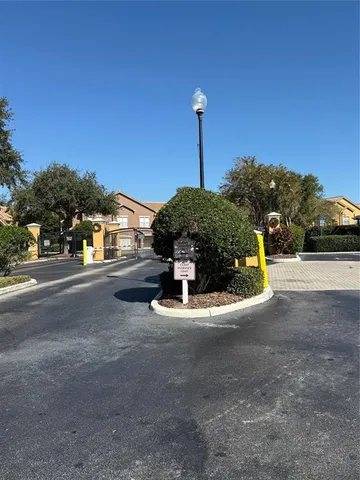 a view of a street with a building