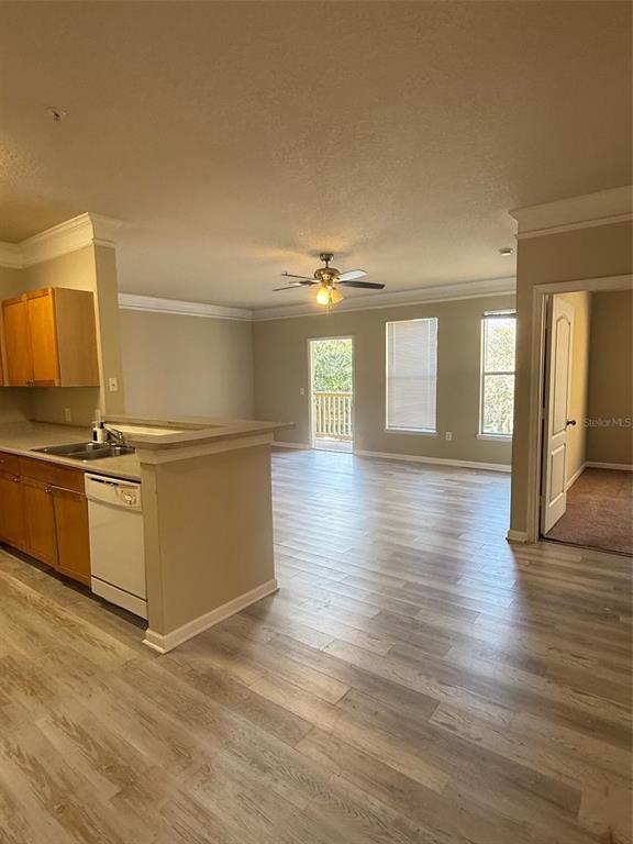 8848 Villa View Circle, Unit 206 Orlando, FL 32821 - Photo 4 of 20 a view of a kitchen with wooden floor
