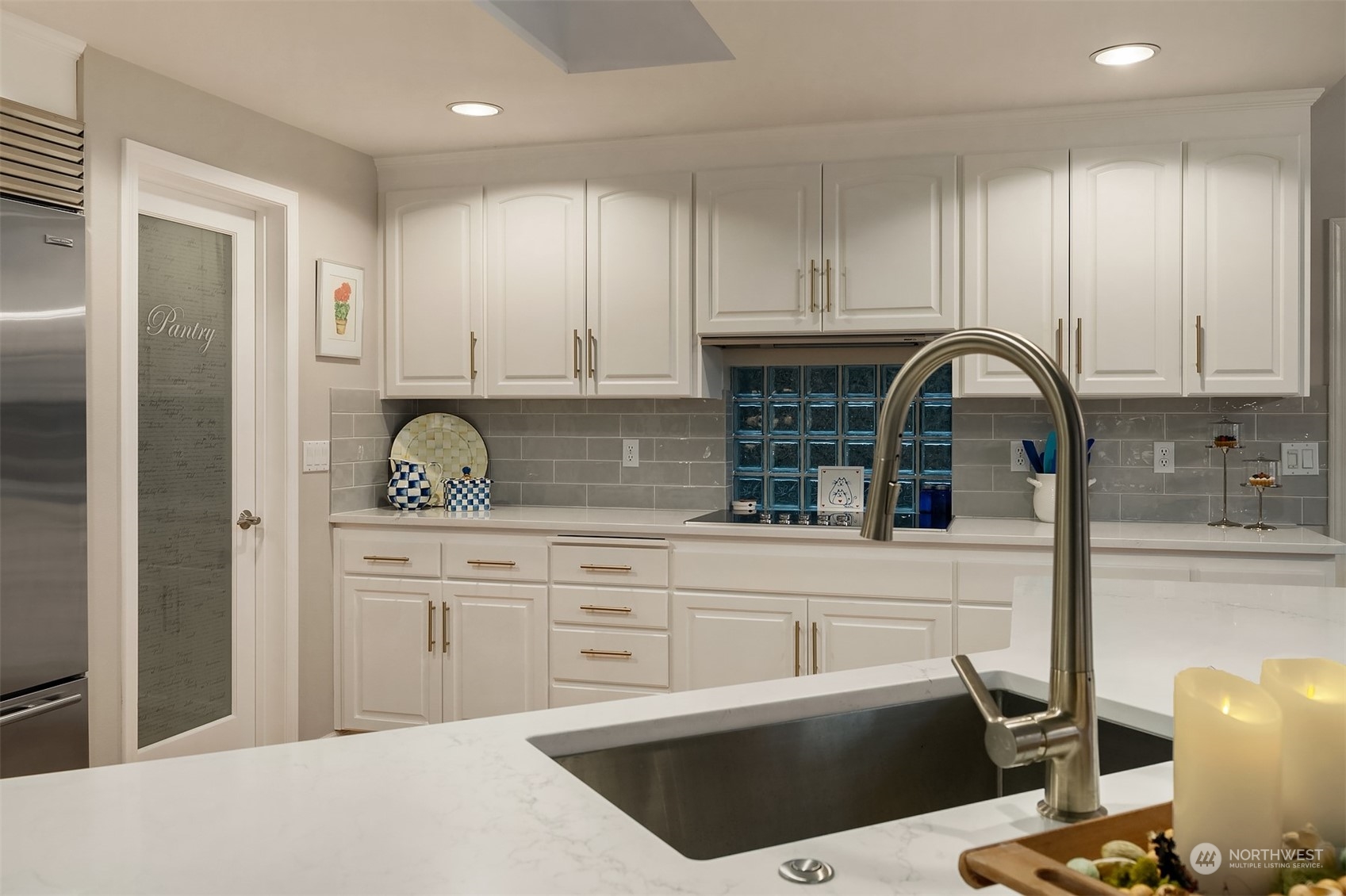 6831 Fisher Road Edmonds, WA 98026 - Photo 20 of 35 a kitchen with stainless steel appliances granite countertop a refrigerator sink and cabinets