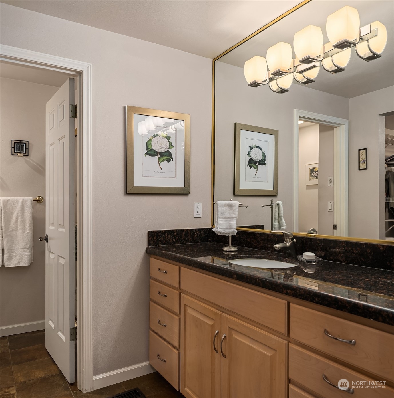 6831 Fisher Road Edmonds, WA 98026 - Photo 25 of 35 a bathroom with a granite countertop sink mirror and vanity
