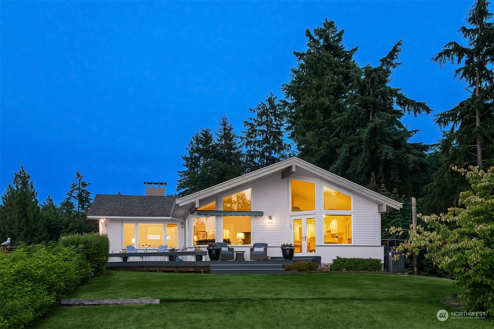 6831 Fisher Road Edmonds, WA 98026 - Photo 32 of 35 a view of a house with a big yard and potted plants