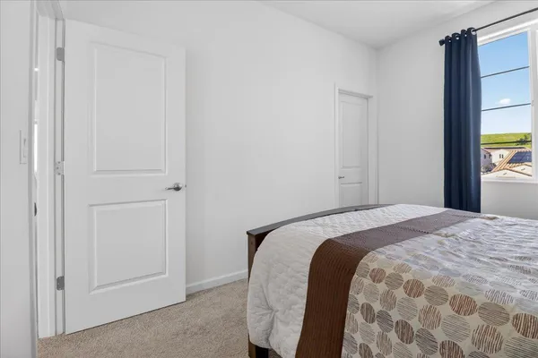 a view of hallway with wooden floor