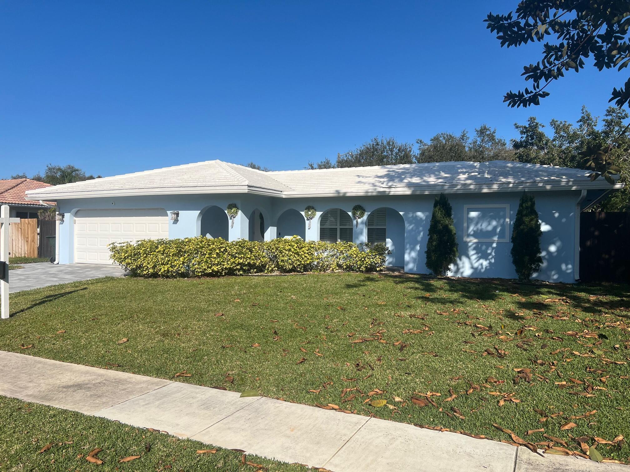 3244 Northwest 25th Way Boca Raton, FL 33434 - Photo 3 of 20 Exterior Front