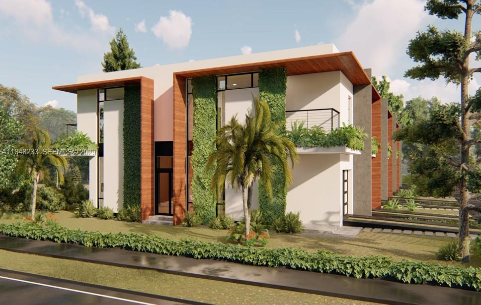 2447 Pierce Street Hollywood, FL 33020 - Photo 2 of 6 a front view of a house with garden