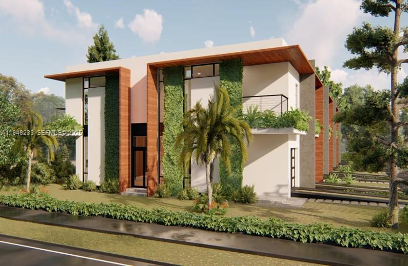 2447 Pierce Street Hollywood, FL 33020 - Photo 6 of 6 a front view of a house with garden