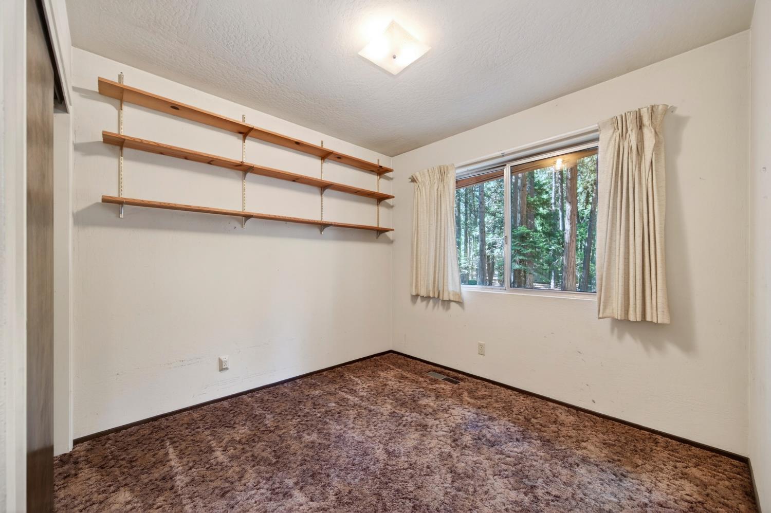 20191 Kit Court Volcano, CA 95689 - Photo 36 of 54 a view of a room with a large window