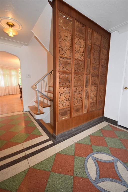 1153 Prospect Road Pittsburgh, PA 15227 - Photo 2 of 23 Beautiful entry with Terrazzo flooring and hand carved teak decorative panels.