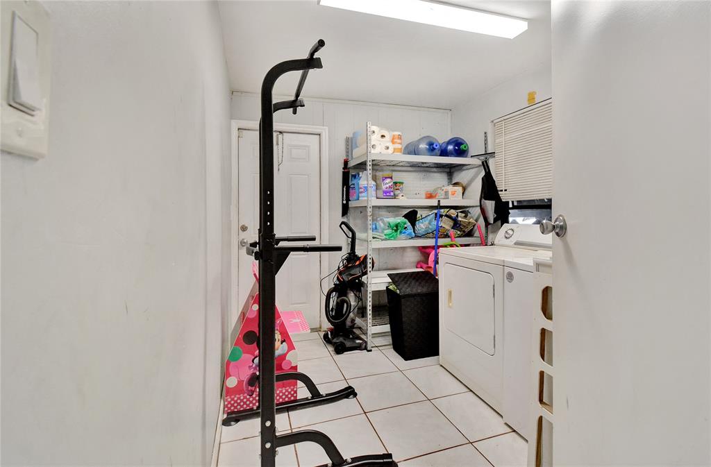 6533 Southwest 22nd Street Miramar, FL 33023 - Photo 8 of 16 a utility room with dryer and washer