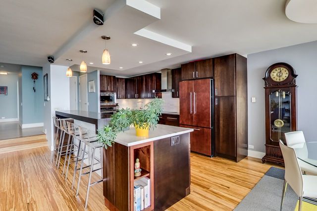5733 North Sheridan Road, Unit 16B Chicago, IL 60660 - Photo 12 of 27 a view of a kitchen and dining room