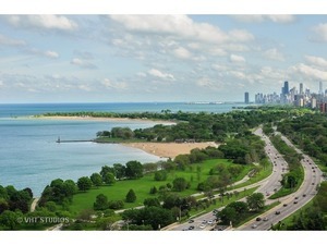 5733 North Sheridan Road, Unit 16B Chicago, IL 60660 - Photo 25 of 27 a view of a lake with a city