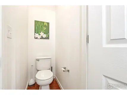 a bathroom with a toilet and a sink