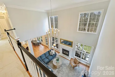 a living room with furniture and flat screen tv