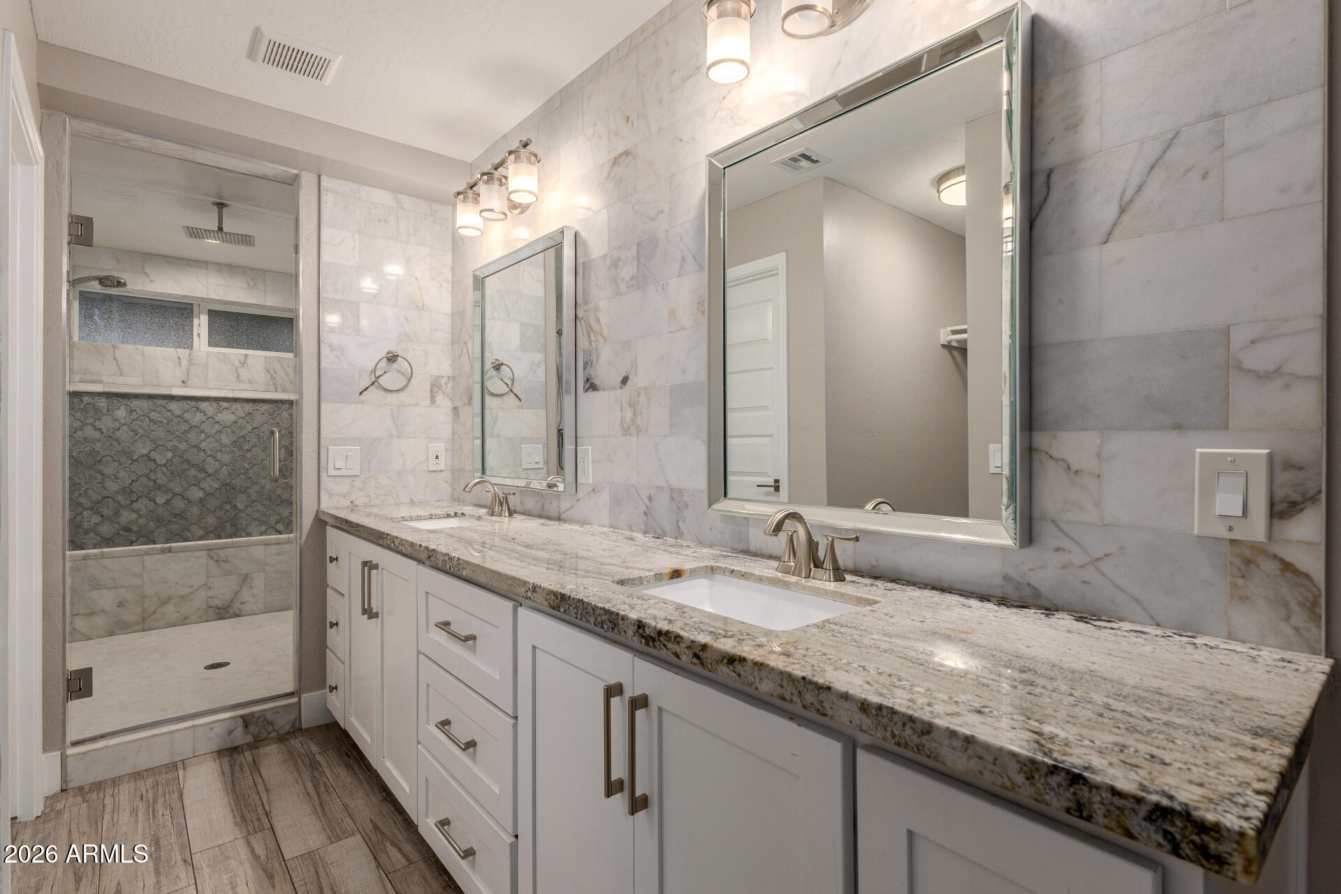 15041 North 6th Street Phoenix, AZ 85022 - Photo 22 of 45 a bathroom with a granite countertop double vanity sink and mirror