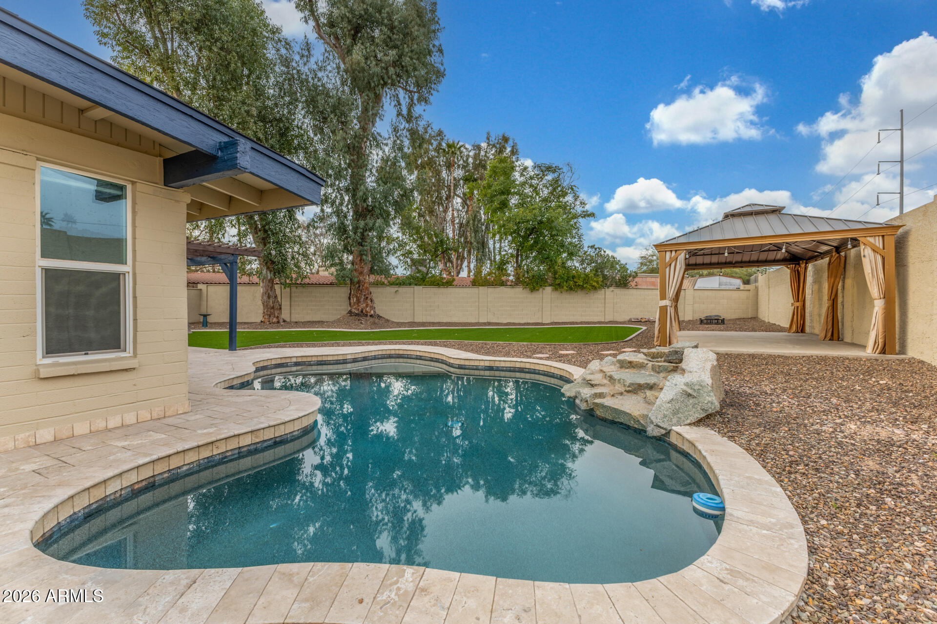 15041 North 6th Street Phoenix, AZ 85022 - Photo 37 of 45 a view of a house with backyard