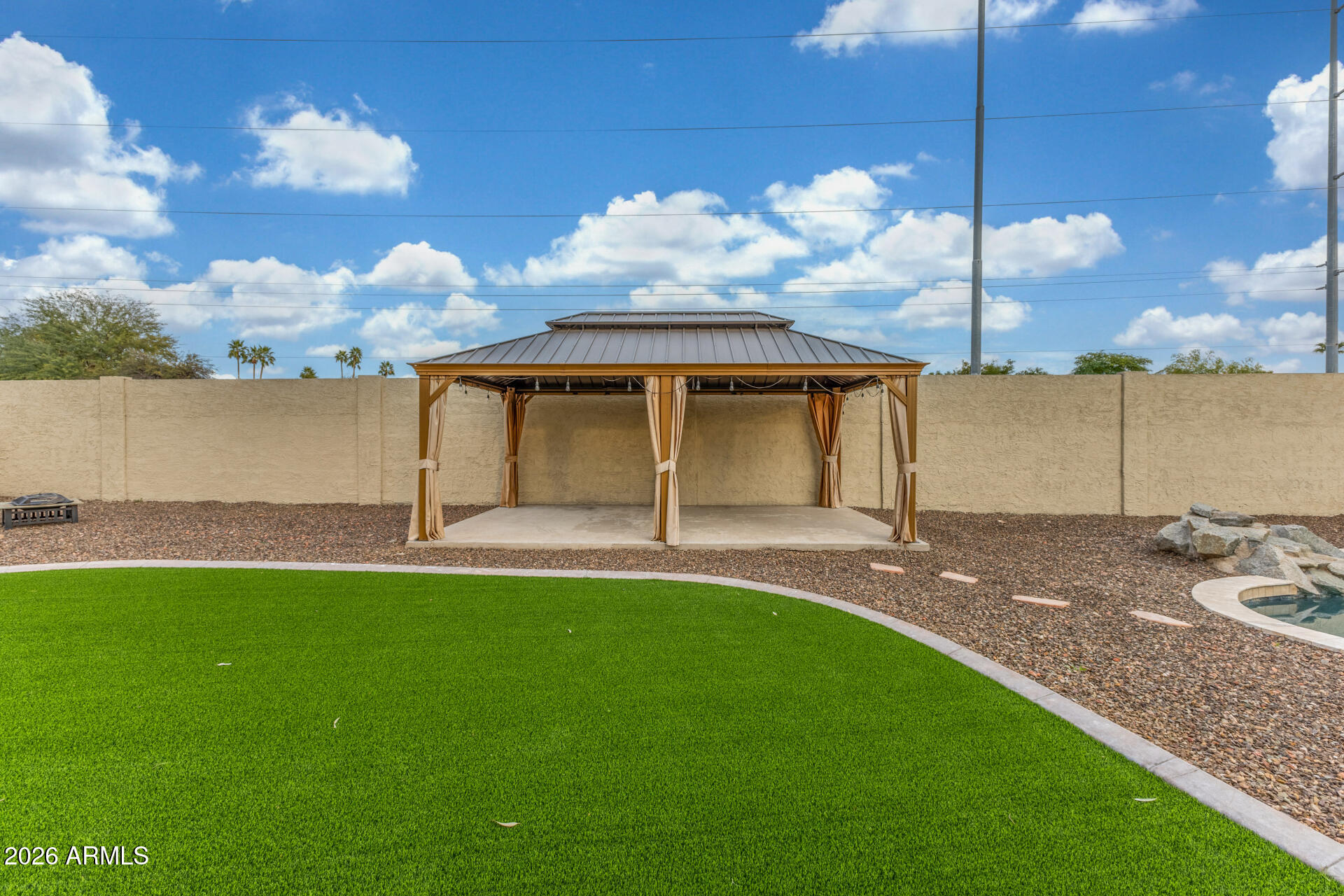 15041 North 6th Street Phoenix, AZ 85022 - Photo 41 of 45 a front view of a house with a yard and garage