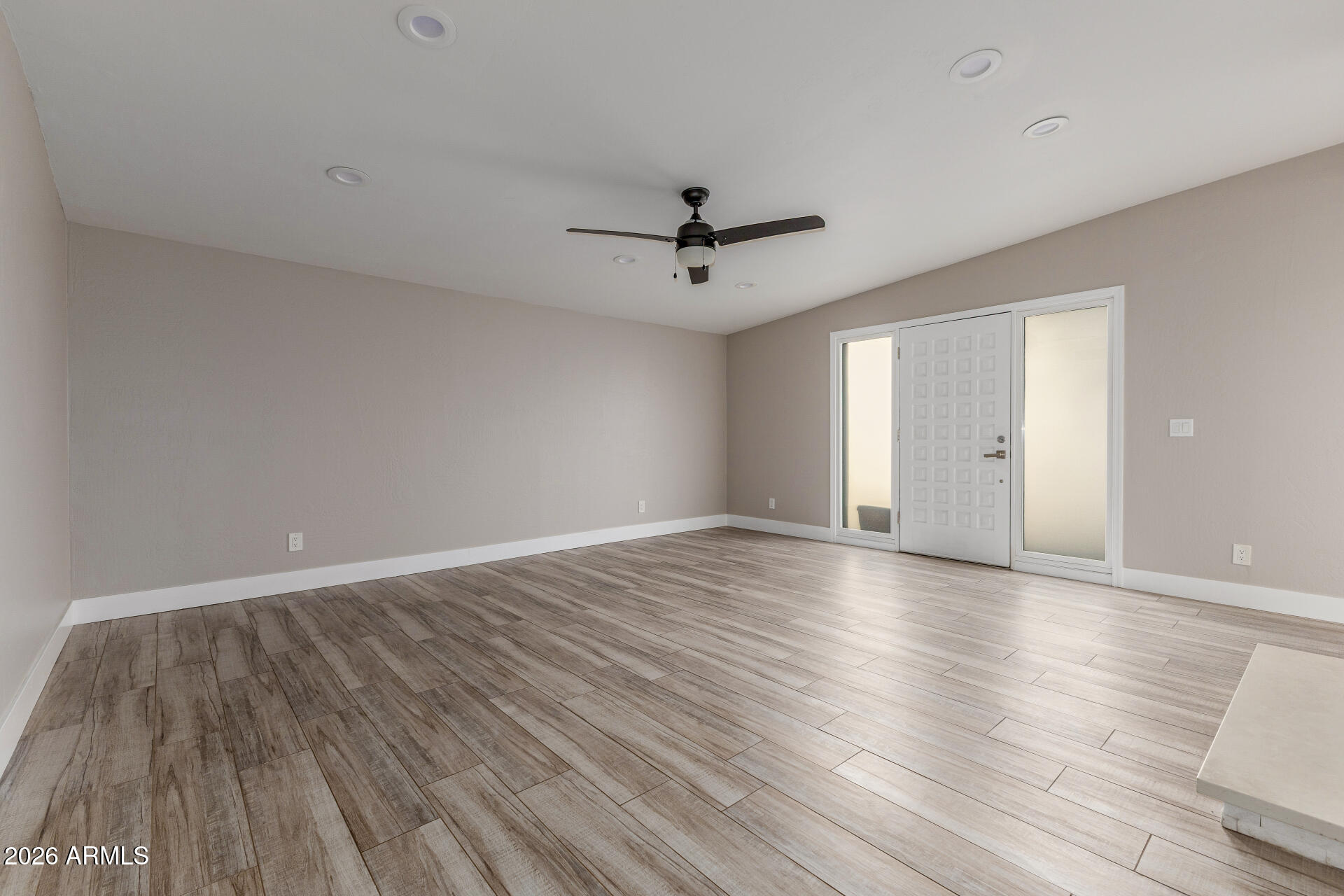 15041 North 6th Street Phoenix, AZ 85022 - Photo 6 of 45 wooden floor in an empty room with a window