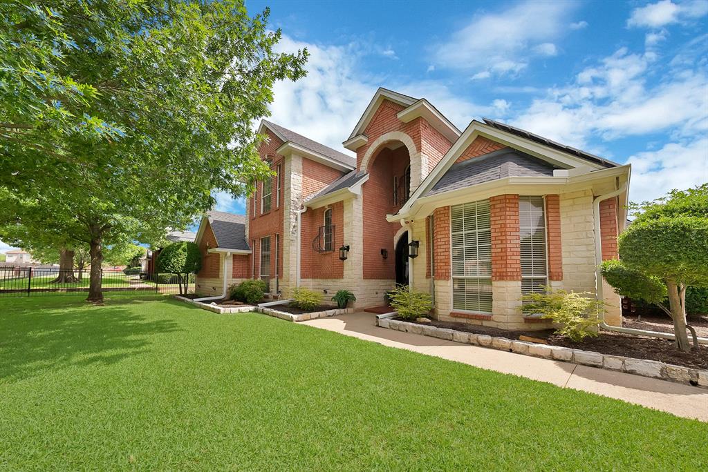 1110 McCampbell Road Mansfield, TX 76063 - Photo 6 of 39 a front view of a house with a yard