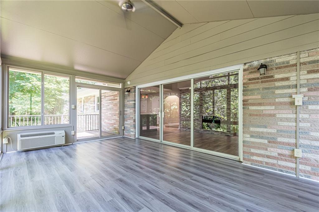 1574 Old Spring House Lane Atlanta, GA 30338 - Photo 26 of 55 a view of empty room with wooden floor and fan
