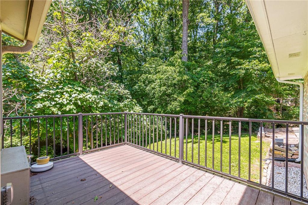 1574 Old Spring House Lane Atlanta, GA 30338 - Photo 29 of 55 a balcony with wooden floor and fence