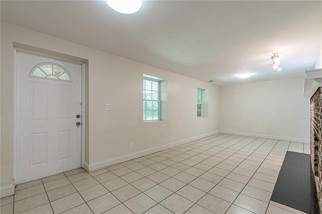 1574 Old Spring House Lane Atlanta, GA 30338 - Photo 46 of 55 an empty room with windows