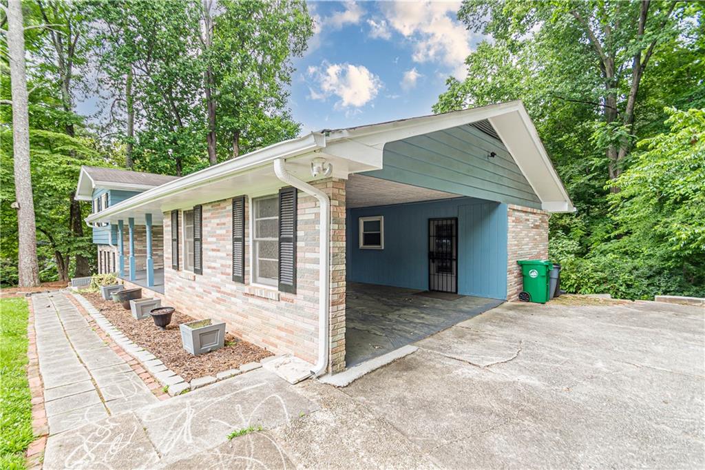1574 Old Spring House Lane Atlanta, GA 30338 - Photo 7 of 55 a view of a house with backyard and sitting area