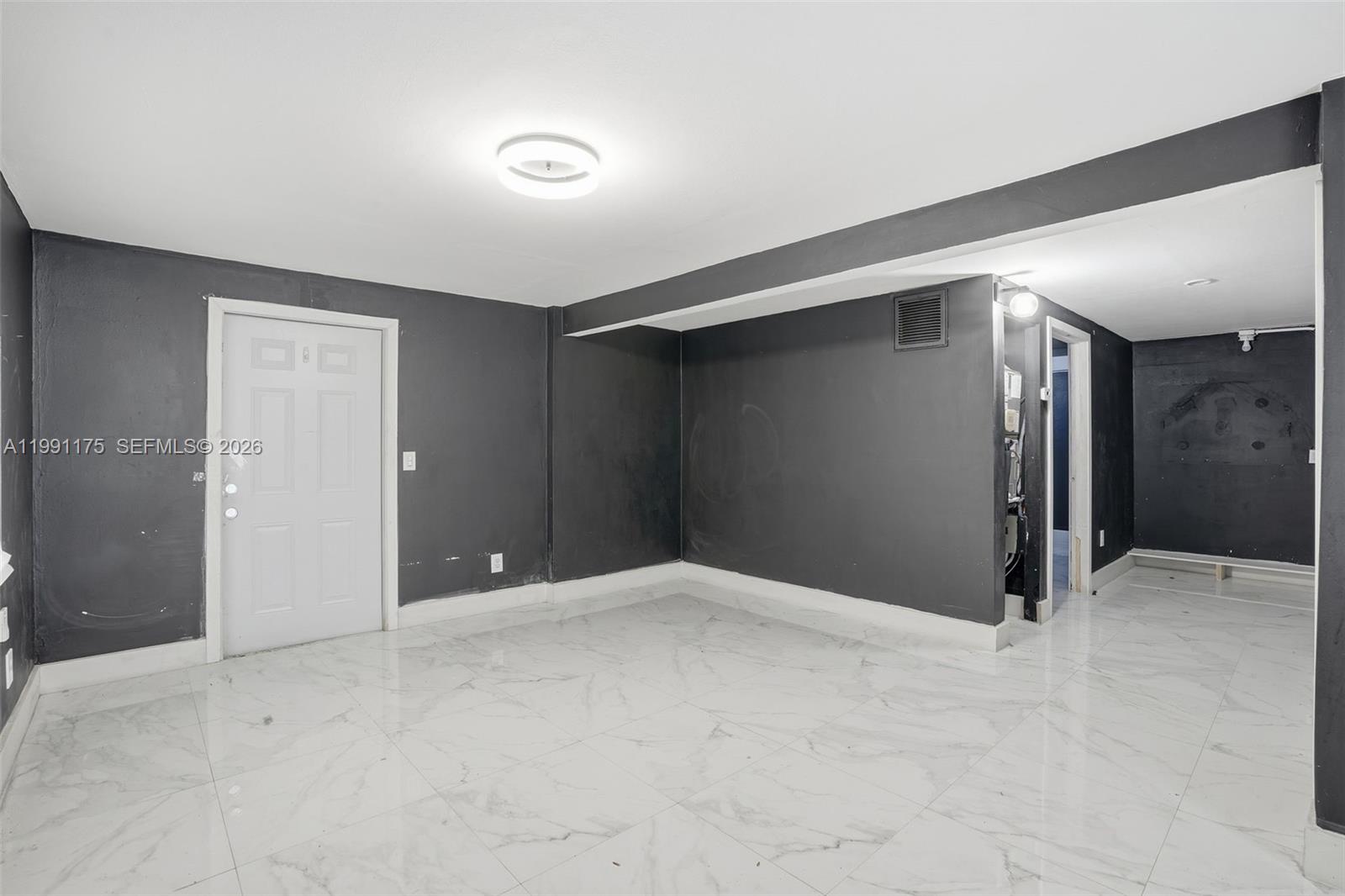 10055 Southwest 52nd Terrace Miami, FL 33165 - Photo 27 of 36 a view of an empty room