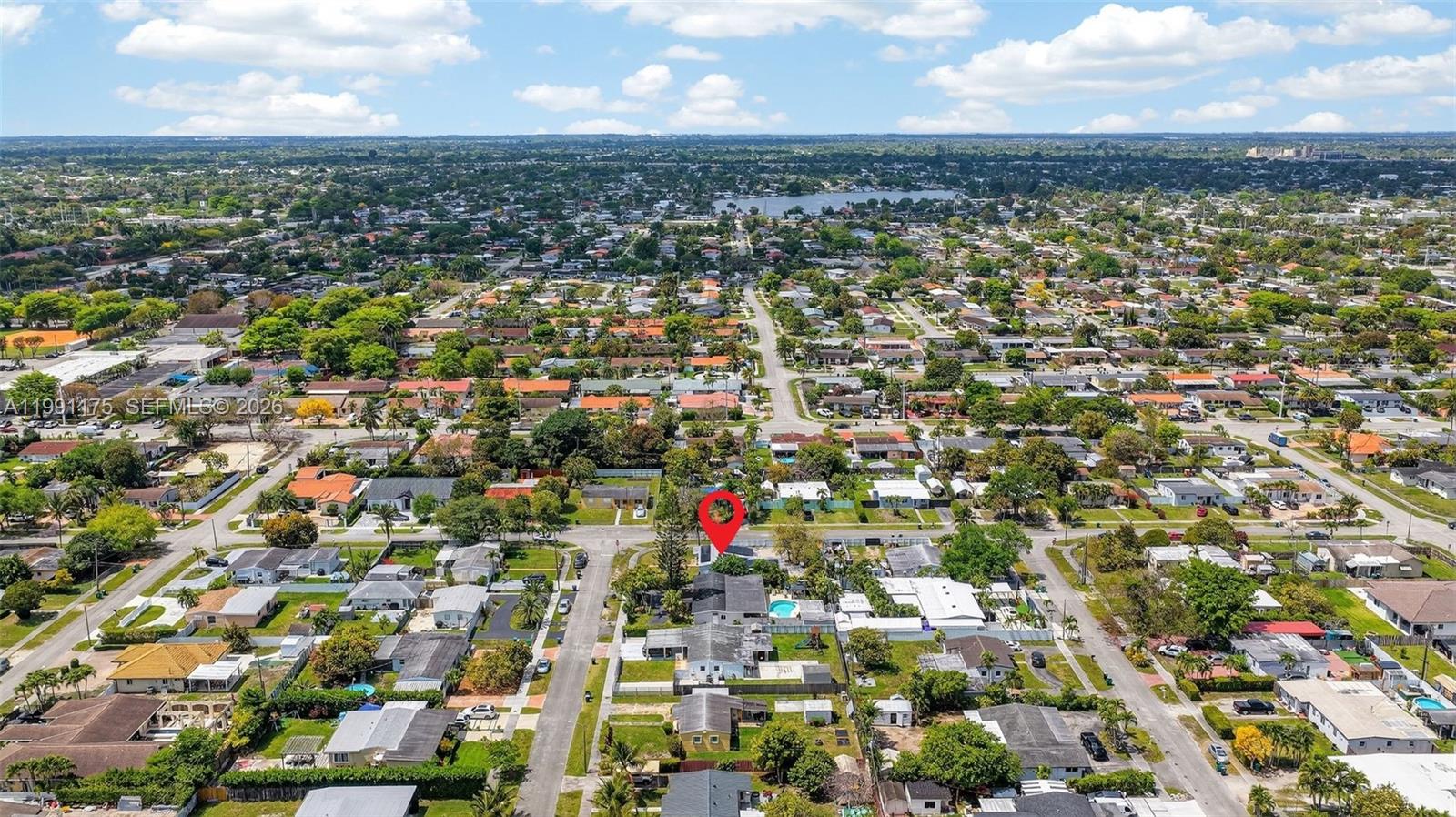10055 Southwest 52nd Terrace Miami, FL 33165 - Photo 33 of 36 an aerial view of residential houses with city view