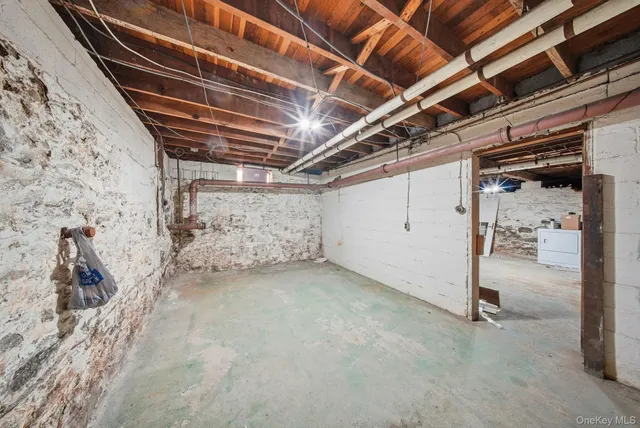 a view of a room with wooden walls