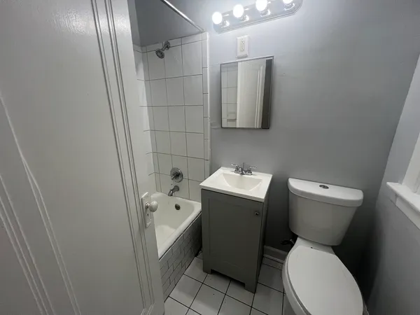 a bathroom with a sink and toilet