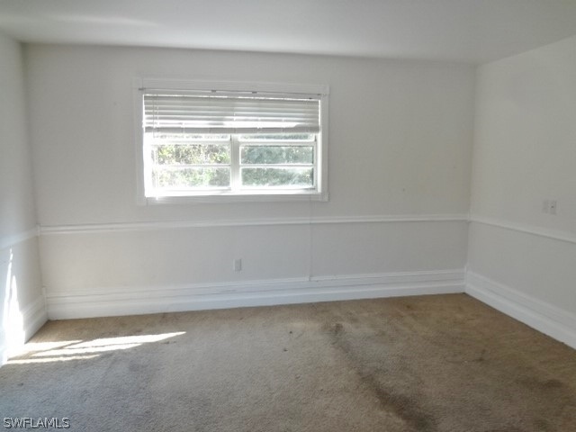 14071 Cemetery Road Fort Myers, FL 33905 - Photo 11 of 18 a view of an empty room with a window