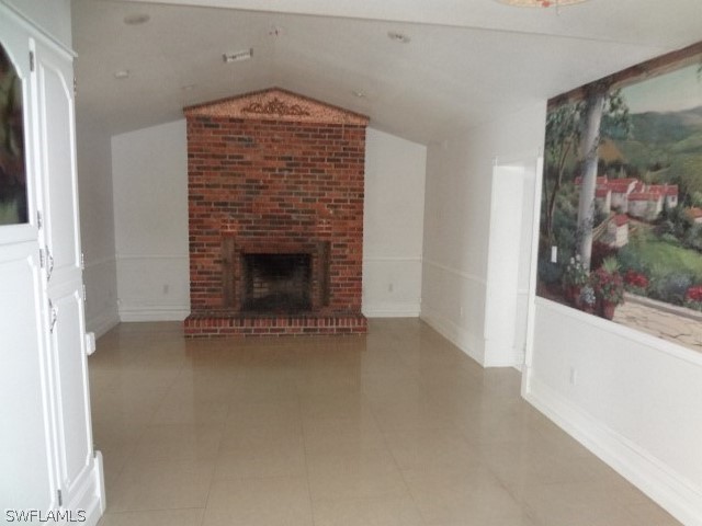 14071 Cemetery Road Fort Myers, FL 33905 - Photo 6 of 18 a living room with a fireplace