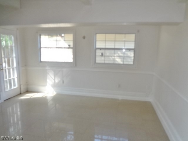 14071 Cemetery Road Fort Myers, FL 33905 - Photo 7 of 18 an empty room with windows
